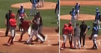 New York Yankees and Philadelphia Phillies coaches throw punches on field during mass brawl