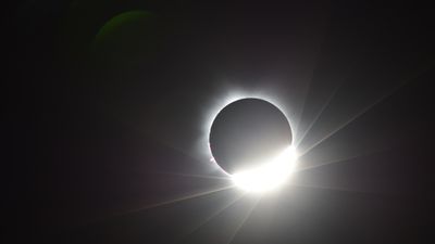 I watched the moon 'take a bite of the sun' in a rare hybrid solar eclipse last week. Here's what I saw from Australia.