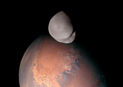 Look! Hope Space Probe Captured Our Best View Yet of Mars' Enigmatic Moon Deimos
