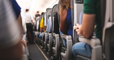 Plane passenger praised after refusing to give up window seat for honeymoon couple