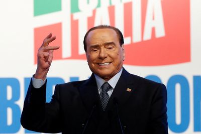 Italy's Berlusconi health improving after three weeks in hospital