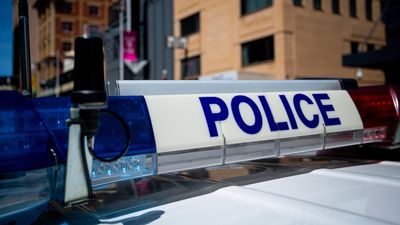 Driver arrested after allegedly taking off from Adelaide random breath test, injuring officer