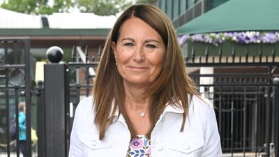 Carole Middleton's bright blue dress features the dreamiest frill detailing and flattering tie-waist