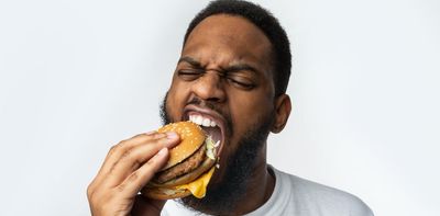 How watching others eat junk food can suppress our appetite and help us lose weight