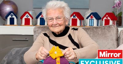 Woman who knitted a woolly Buckingham Palace fashions Coronation tea cosy - how to make your own