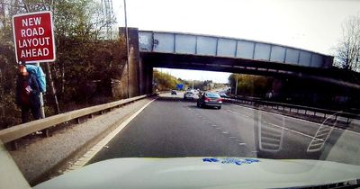 Police catch pedestrian 'hitchhiking' at side of Scotland's busiest motorway