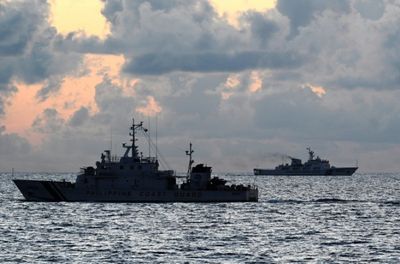 Chinese and Philippine vessels in near-collision