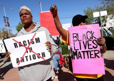 In racist police text scandal, US town sees echoes of an intolerant past