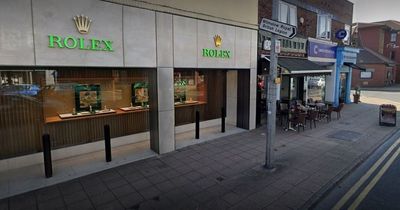 Burglars smash through wall into Rolex store via café next door - but hit locked door