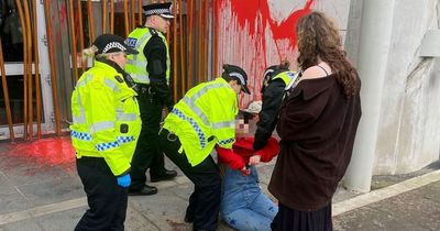 Two women arrested after climate change protesters deface Scottish Parliament building