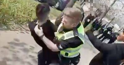 Schoolboy smashes head off ground after Scots cop throws him to floor as dad 'sickened by footage'