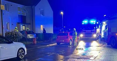 Car smashes into Scots flats as emergency services rush to scene