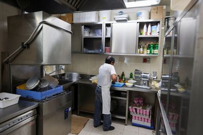 Analysis-Skilled, educated and washing dishes: how Italy squanders migrant talent