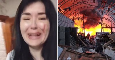 Ukrainian woman covered in blood cries as she's trapped in flat bombed by Russia