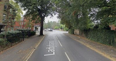 Road shut both ways after car crashes into back of bus