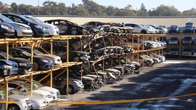 Blaze destroys dozens of cars in Pickles Auctions car yard in Bibra Lake