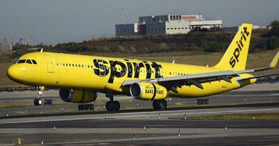 Plane passengers horrified as airport worker spotted taping up Spirit Airlines wing