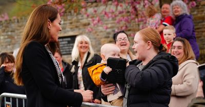 Kate Middleton's £675 designer handbag is snatched by baby - as mortified mum looks on