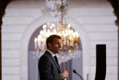 Braving boos, Macron hopes 'cathartic' walkabouts will soothe pension anger