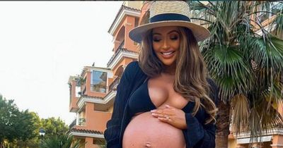 Pregnant Charlotte Dawson says 'I'm aware' as she responds to backlash while cradling bare baby bump in bikini