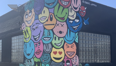 Brendan Cooney’s emoji-filled mural on the Northwest Side is meant to make you smile