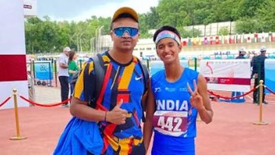 Heena wins gold, sets Asian mark