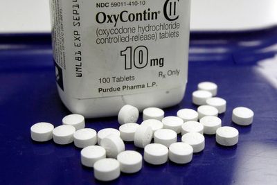 Frustration grows over wait on OxyContin maker's settlement
