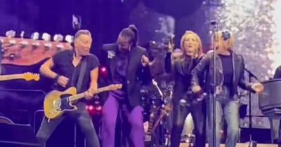 Michelle Obama wows fans as she performs on-stage with Bruce Springsteen