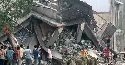 Up to 60 people feared trapped as three-storey building collapses in India