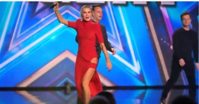 BGT's Amanda Holden teases her incredible toned legs in crimson dress with daring dance move