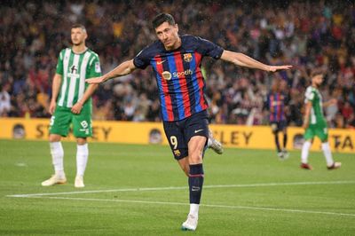 Barca romp past Betis with title in sight