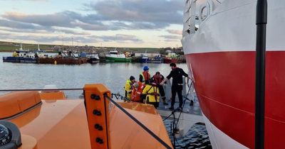 Lifeboat crew rescues 60 passengers from stranded Scots ferry which ran aground
