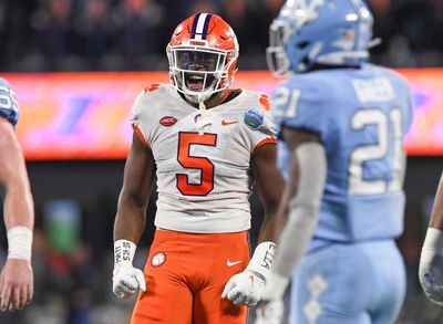 WATCH: K.J Henry’s dad dons Washington jersey after Commanders drafted his son