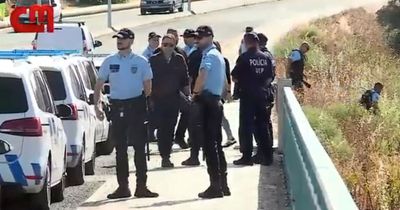 Four men dead in street shooting as police find shotgun at scene among bodies