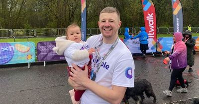Baby girl carried over Glasgow Kiltwalk finish line months after surviving open heart surgery