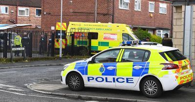Police surround flats after man having medical episode 'brandishes knife'