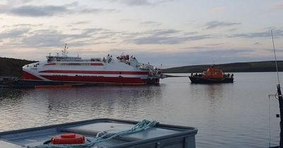 Probe launched after ferry runs aground near Orkney and evacuates 60 passengers