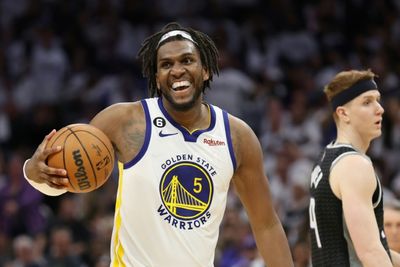 Looney's rebounding sparks Warriors into NBA second round