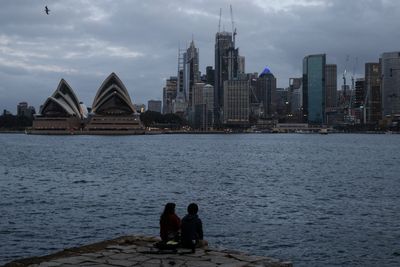 Australia to reveal huge budget rebound, pledge restraint in response
