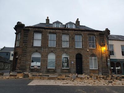 Old bank building collapses onto road leading to A9 closure
