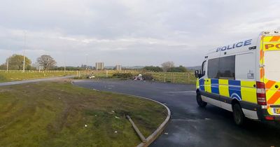 Travellers set up camp in Leeds and 'throw rocks, branches and fence posts' at passing drivers