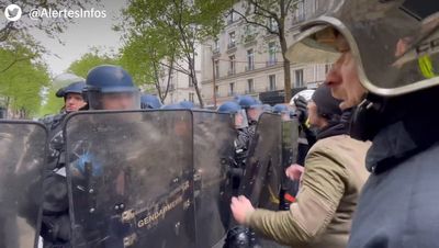 More than 100 officers injured in clashes with protesters in France as thousands march against pension reforms