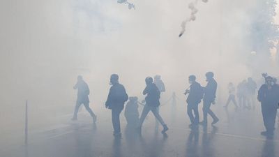 French police fire tear gas as May Day rallies turn violent