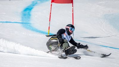 Sit skier hits streets in global running race