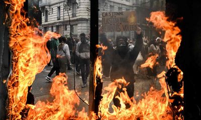 At least 108 police injured and 291 held in May Day protests in cities across France