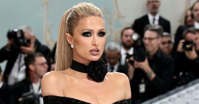 Paris Hilton amazes in black gown in Met Gala debut after protestors BLOCKED entrance