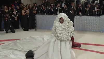 Rihanna shuts down the Met Gala red carpet in a bridal look by Valentino