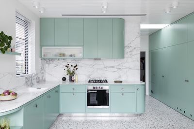 Should I use handles or knobs on kitchen cupboards? Designers agree unanimously