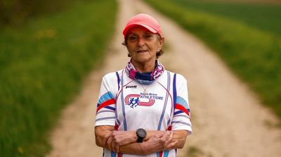 Surrounded by Marathon Medals, an 83-Year-Old Dreams of Paris