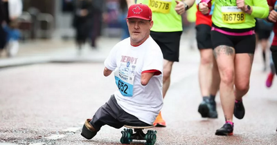 Canadian man born without limbs completes Belfast Marathon on a skateboard